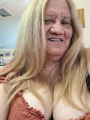 check at large 70 year old woman photo