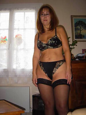 mature moms in stockings displaying her pussy